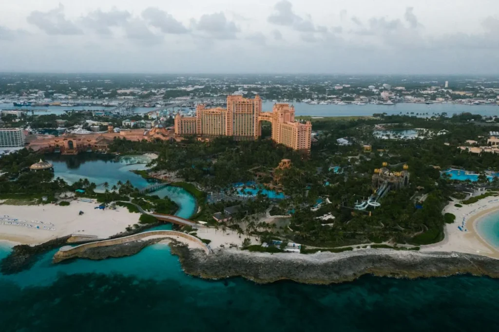 Aerial view of Atlantis Paradise Island resort, beaches, and blue Caribbean water in Nassau, Bahamas.