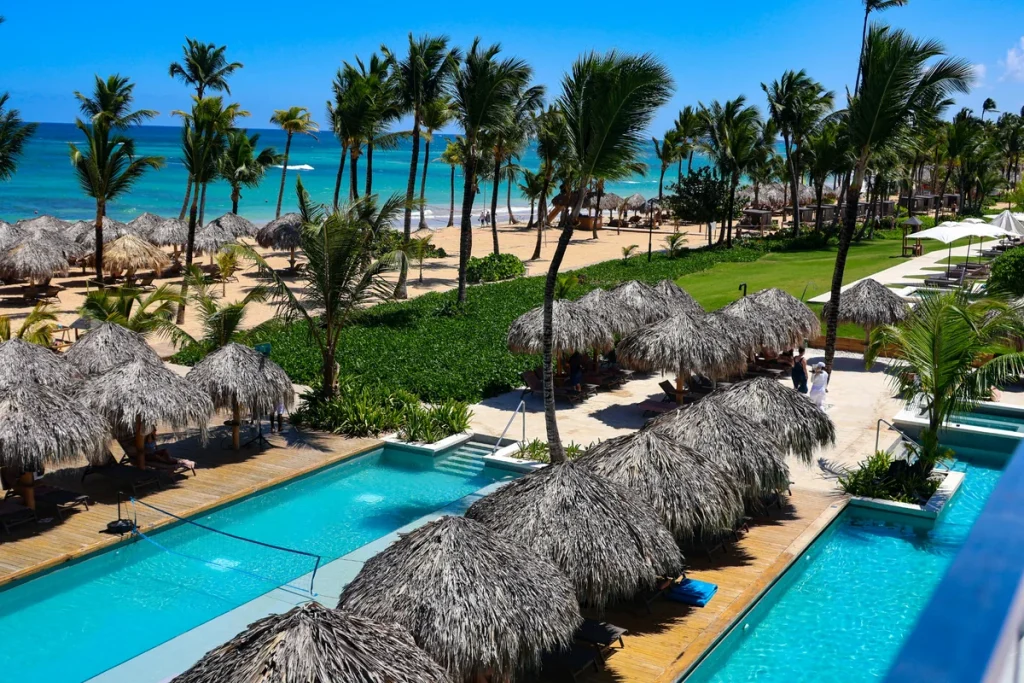 Caribbean beachfront resort with pools and palm trees in Punta Cana