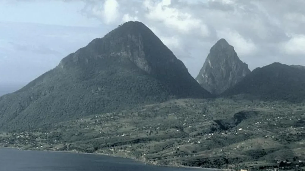 The Pitons rising above the coast of Saint Lucia