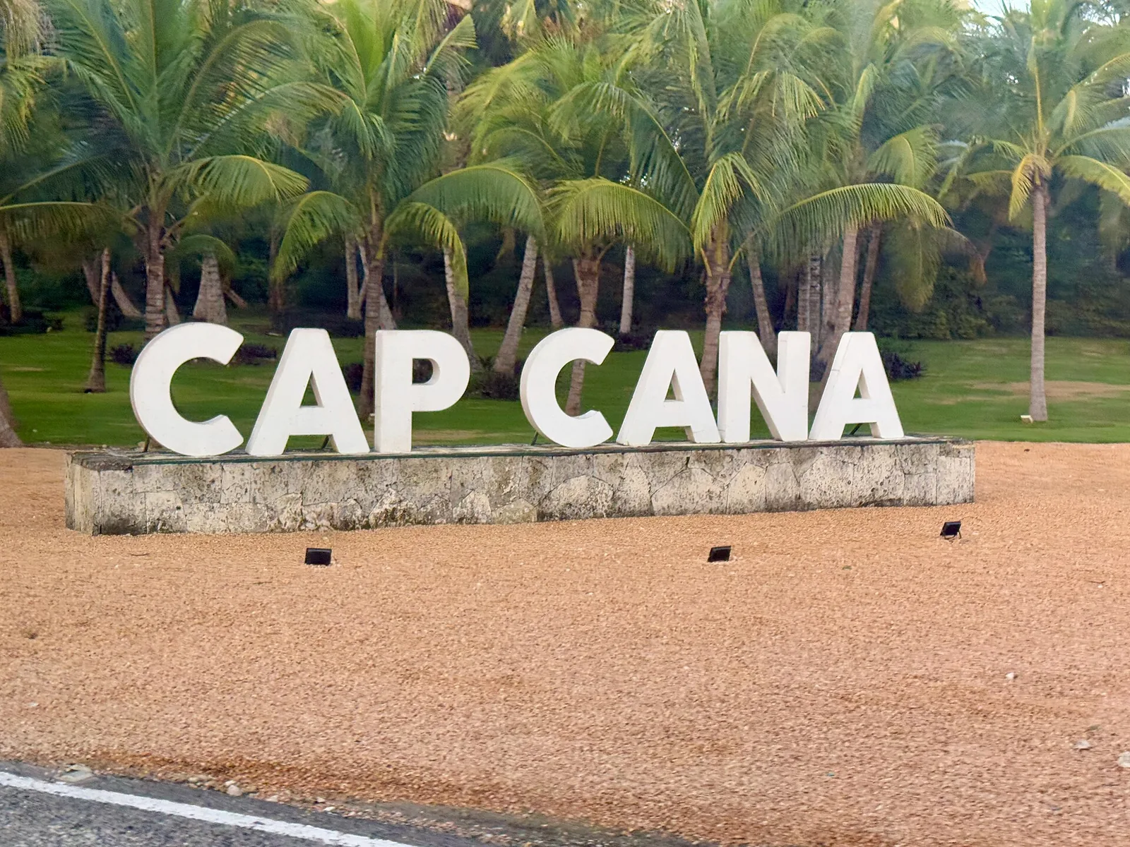 Cap Cana entrance sign with palm trees in the Dominican Republic
