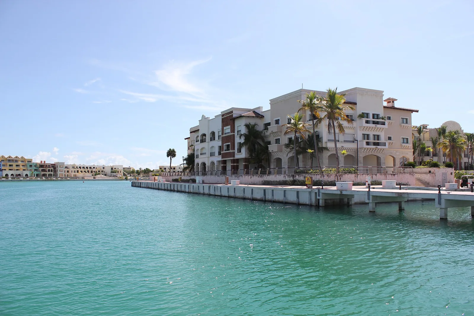 Cap Cana waterfront buildings beside turquoise marina water